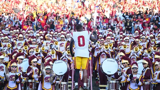 USC Trojans Football running back MarShawn Lloyd leads marching band with sword