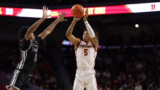 USC Trojans Basketball guard Boogie Ellis shoots over Brown Bears