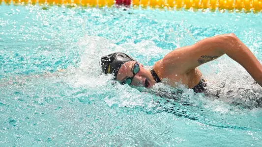 Claire Tuggle swimming freestyle for USC swim