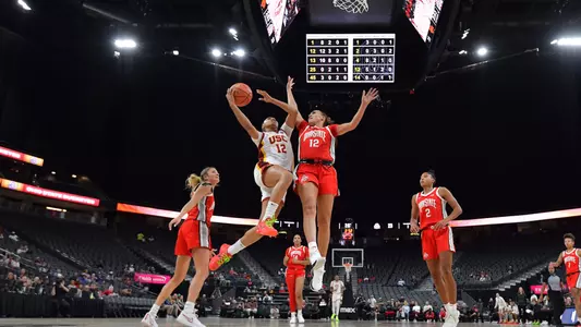 JuJu Watkins rises up for a score in her 32-point debut for USC, beating No. 7 Ohio State in Las Vegas