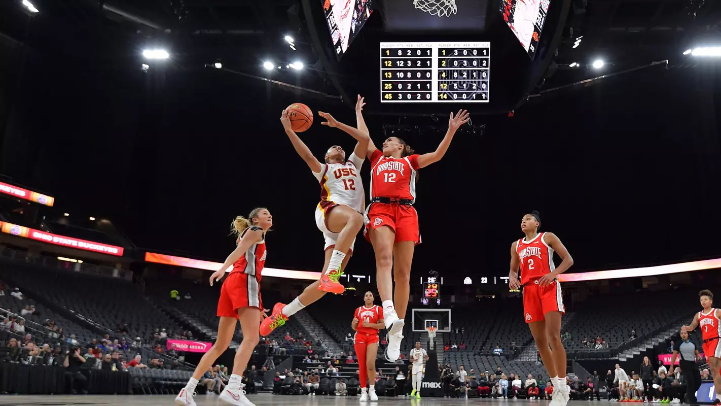 JuJu Watkins rises up for a score in her 32-point debut for USC, beating No. 7 Ohio State in Las Vegas