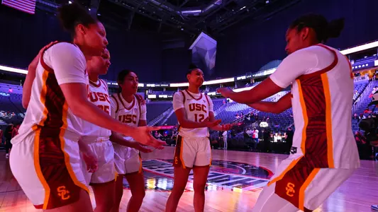 USC's starters give fives before a win over Ohio State in Las Vegas
