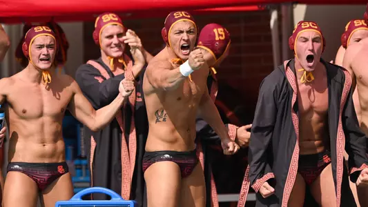USC bench players cheer after a goal vs. Stanford