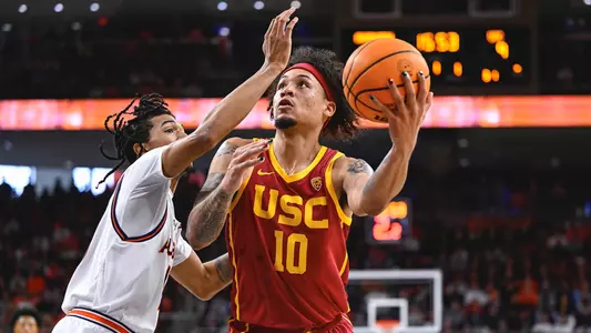 USC Trojans Basketball guard DJ Rodman lays up against Auburn Tigers