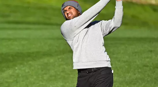 Trojan Freshman Mahanth Chirravuri takes a third-round swing at North Ranch on Wednesday.