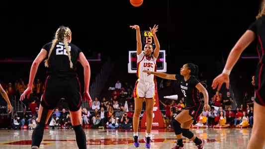 Taylor Bibgy fires off a 3-pointer in USC's upset win over No. 2 Stanford at Galen Center