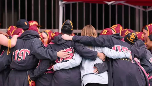 USC team huddles up before its 2023 home opener vs. UC Irvine at Uytengsu Aquatics Center