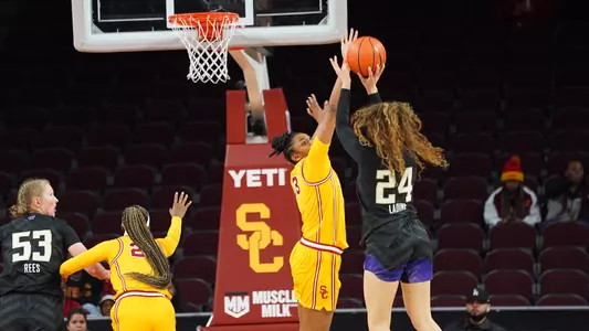 Rayah Marshall blocks a Washington shot at Galen Center
