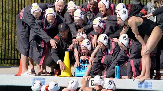 USC team cheers poolside during a game at the Barbara Kalbus Invitational