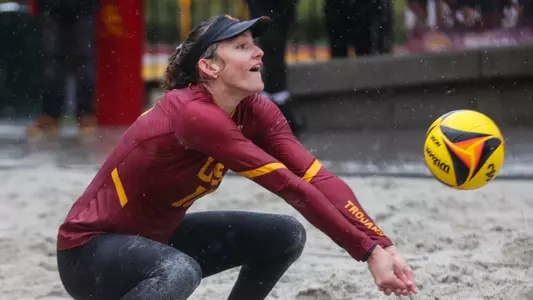 Madison White passes the ball in the rain