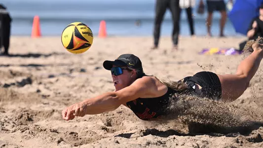 Madison Shields dives for a ball