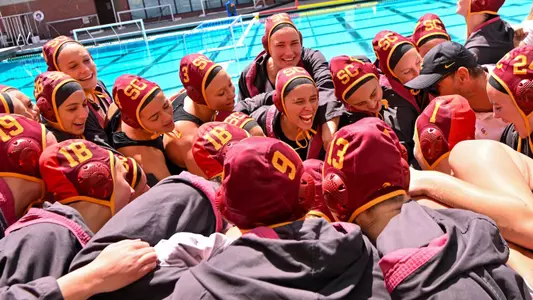 USC team huddles up for a pregame cheer before beating Arizona State at Uytengsu Aquatics Center