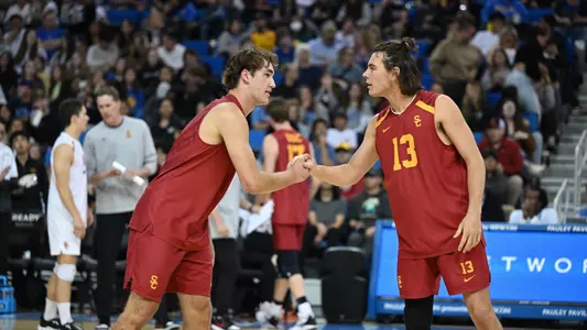 Dillon Klein and Nate Tennant shake hands