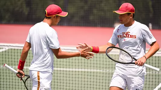 Bradley Frye and Learner Tien high-five