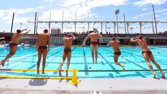 USC starters jump into the pool before a home game