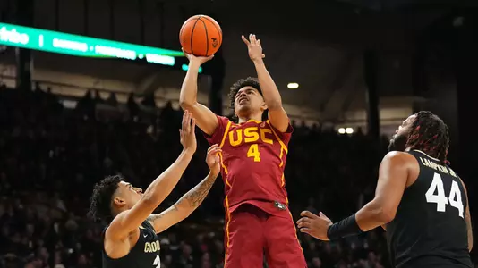 USC Trojans Basketball guard Oziyah Sellers shoots over Colorado Buffaloes