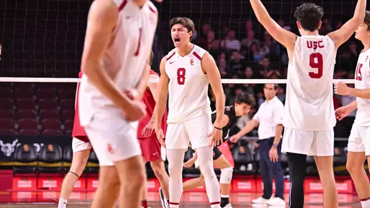 Kyle Paulson celebrates a block