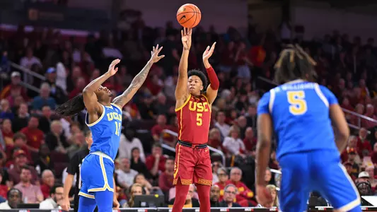 USC Trojans Basketball guard Boogie Ellis shoots over UCLA Bruins