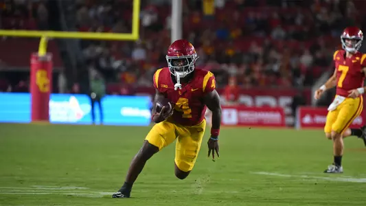 USC Trojans Football Running Back Woody Marks rushes against Rutgers