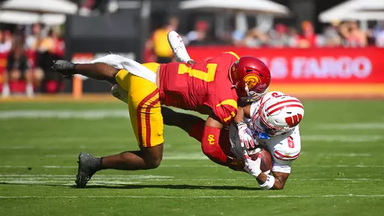 USC Trojans Football safety Kamari Ramsey tackles against Wisconsin Badgers