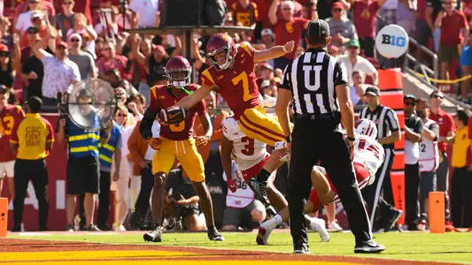 USC Trojans Football quarterback Miller Moss dives for touchdown against Wisconsin Badgers