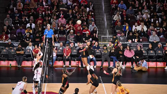 Ally Batenhorst attacks the ball during a USC women's volleyball match against the Wisconsin Badgers at Galen Center on Thursday, Nov. 14. The Women of Troy lost in three sets.