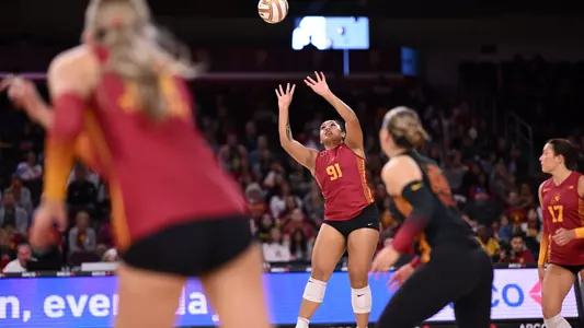 USC women's volleyball setter Mia Tuaniga sets the ball in a 3-2 win against 11th-ranked Oregon at Galen Center.