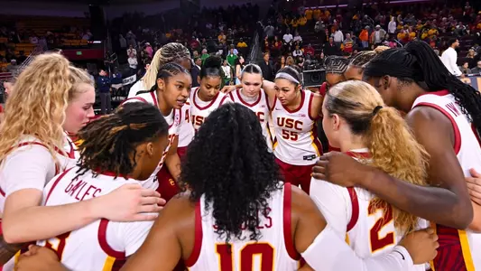 USC players huddle up before a game at Galen Center