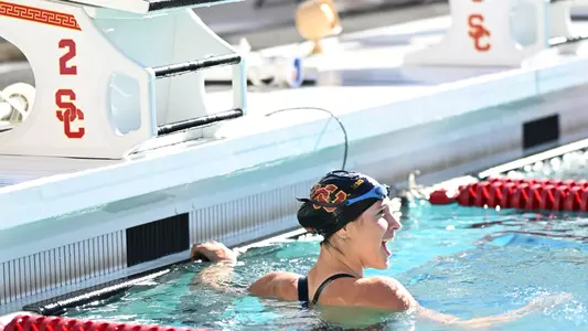 Minna Abraham of USC swim celebrates after a big win