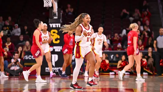 Malia Samuels celebrates a score in USC's win over Fresno State at Galen Center