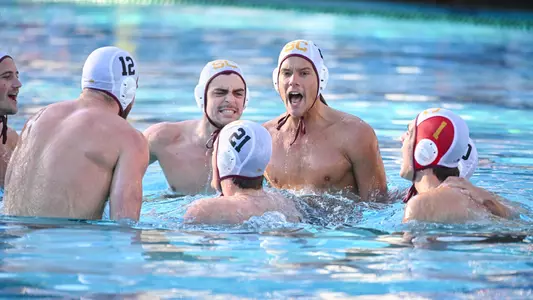 USC starters cheer in the water before the MPSF Championship game