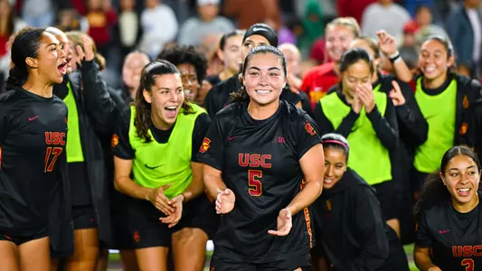 Maile Hayes and the rest of the USC Women's soccer teams celebrates with fans at BMO Stadium after a win over Ohio State.