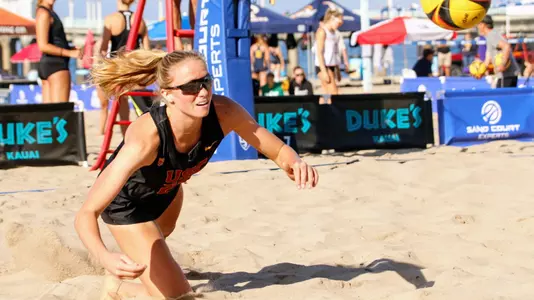 Megan Kraft dives for a ball