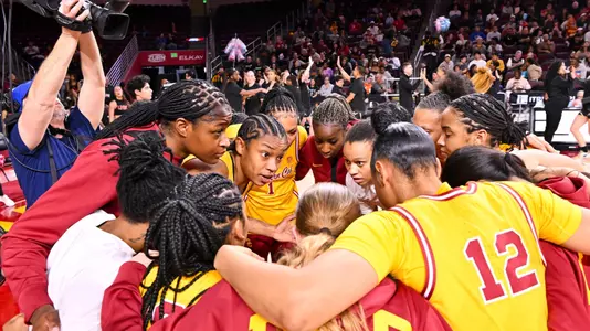 USC team huddles up before a Galen Center
