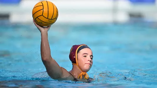 Maggie Johnson passes the ball in the scrimmage at Uytengsu Aquatics Center