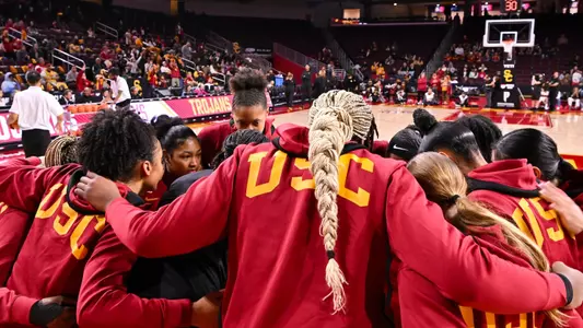 USC team huddles up before a game at Galen Center