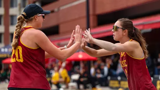 Madison Goellner and Mabyn Thomas high five