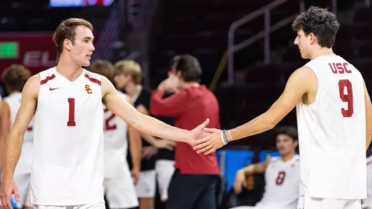 Dillon Klein and Caleb Blanchette shake hands