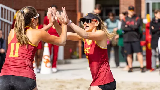 Madison White high fives Maddi Kriz