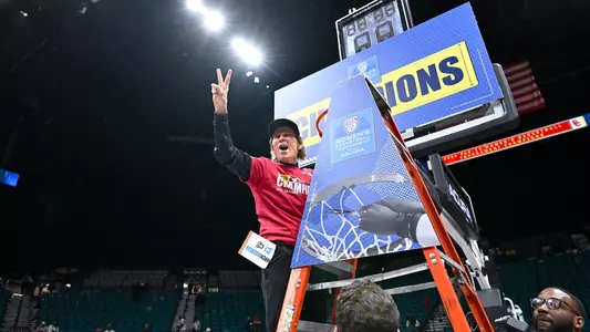 Beth Burns celebrates USC Trojans Women's Basketball winning Pac-12 Tournament championship
