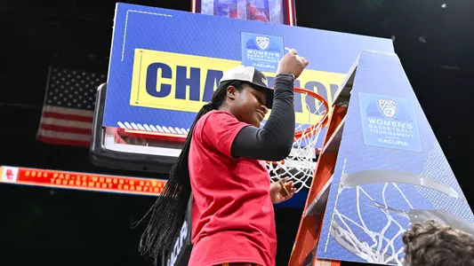 Clarice Akunwafo celebrates USC Trojans Women's Basketball winning Pac-12 Tournament championship