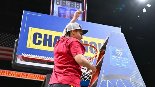 Kaitlyn Davis celebrates USC Trojans Women's Basketball winning Pac-12 Tournament championship