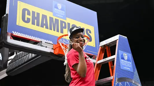 Roxane Makolo celebrates USC Trojans Women's Basketball winning Pac-12 Tournament championship