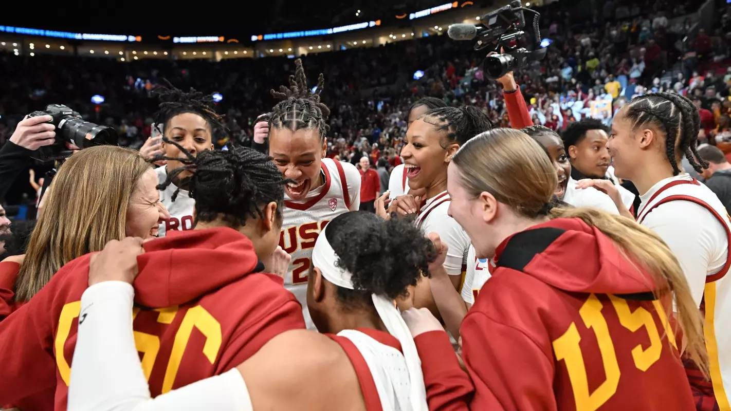 USC team and coaches celebrate Sweet 16 win over Baylor