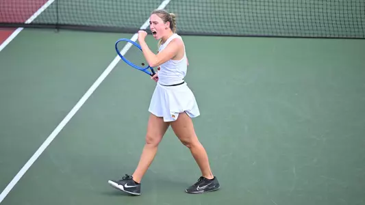 Grace Piper celebrates after winning her match against UCSB.
