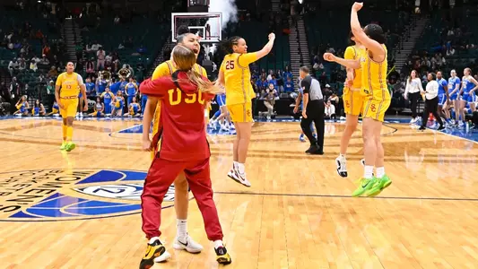 USC players celebrate Pac-12 semifinal win over UCLA in Las Vegas