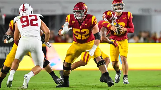 Jarrett Kingston protecting Caleb Williams.