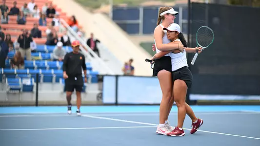 Lily Fairclough and Eryn Cayetano Hug following doubles