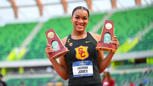 Jasmine Jones with NCAA trophies