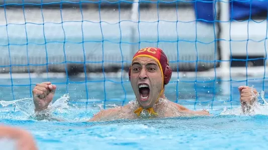 Bernardo Herzer cheers after one of his nine saves vs. Pepperdine at Uytengsu Aquatics Center